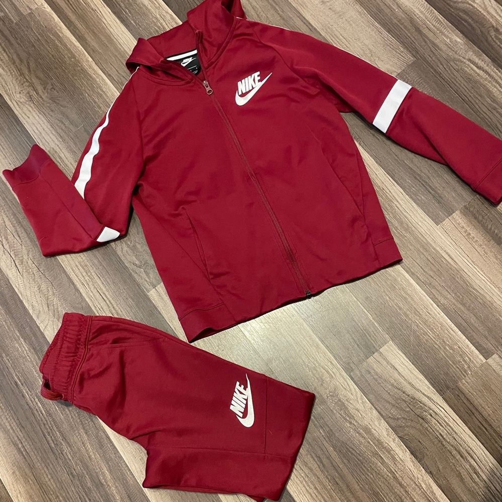 Maroon track suit from Nike.
